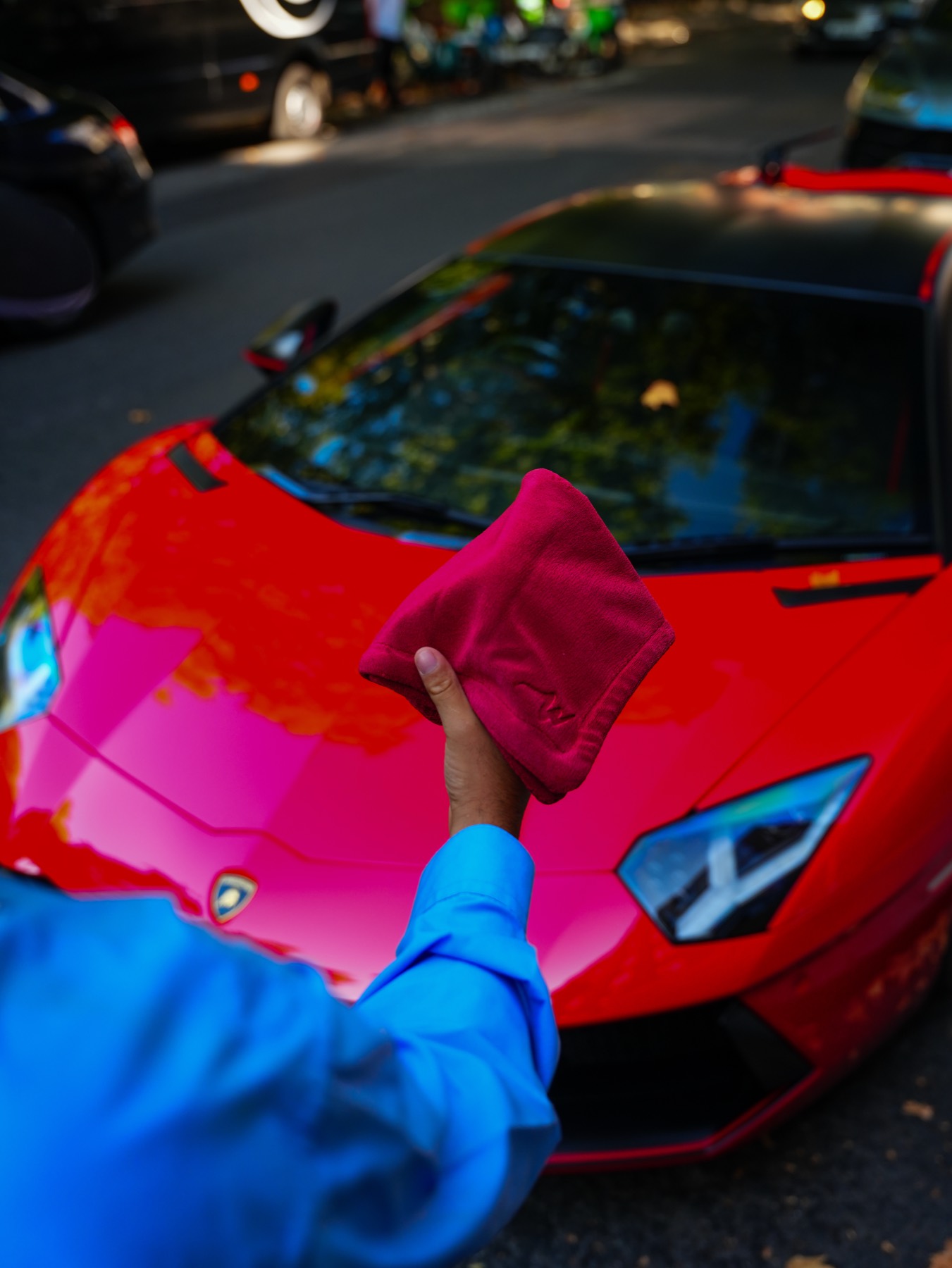 MicroWype+ held over a red Lamborghini Aventador