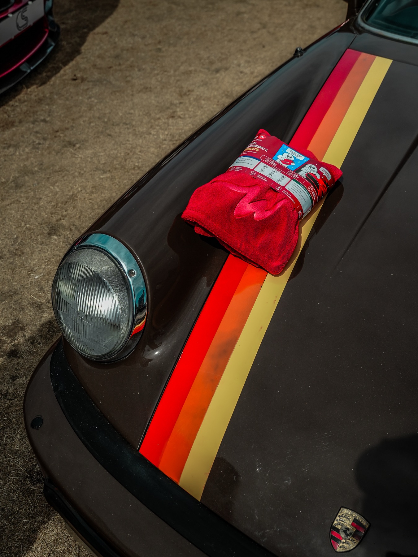 NanoWype+ packaged towel on a striped classic Porsche 911 bonnet