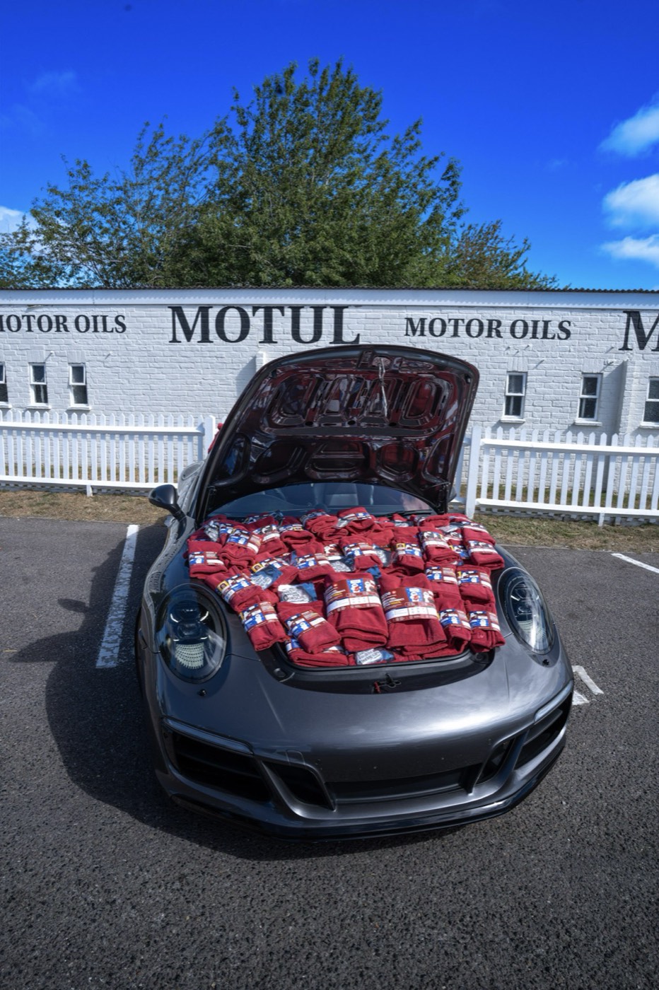 wype towels in the front boot of a Porsche 911 at Goodwood